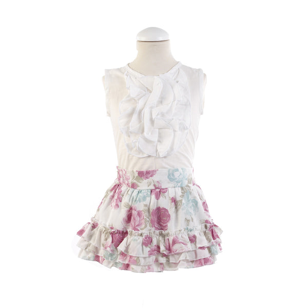 Conjunto Falda-Blusa con flores de maquillaje.