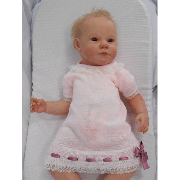 Vestido bebé niña en punto rosa y pasacintas de Sardón