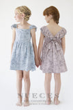 Vestido Andrea de niña topos grises de Nueces Kids en dos colores.