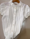 Conjunto Niña Blusa y Falda (Chaqueta no incluido)