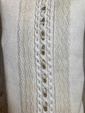 Pelele bebé punto con puntilla beige y lazo de Nezo