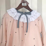 Vestidos para niña de la marca Mon Petit Bonbon. Color rosa con topitos gris