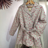 Gabardina Niña con estampado en Flores.