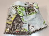 Conjunto Niño de camisa con encaje verde y pantalón estampado de Nini Moda Infantil.