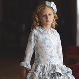 Vestido niña verde con estampado pájaros.