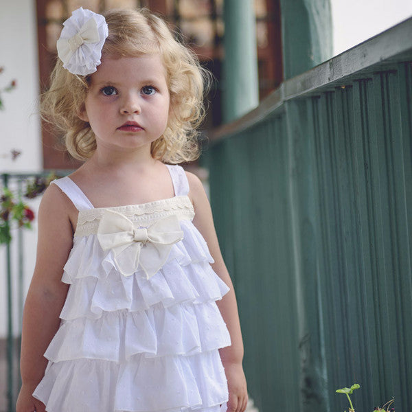 Vestido blanco bebe niña con braga a juego de tela de plumeti La Ormiga.